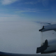 NASA’s Operation IceBridge at work, flying over a vast Greenland ice sheet.